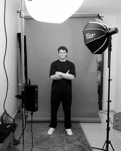 Max Keable standing in a photo studio